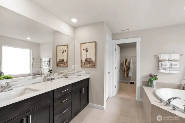 Primary ensuite includes a free-standing tub! Photo's are for representational purposes only. Colors and finishes may differ.
