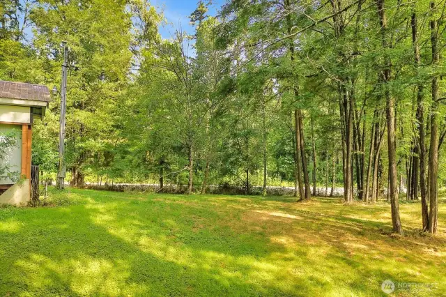 Mature trees, open pasture, and peaceful surroundings—perfect for gardens, animals, or recreation.