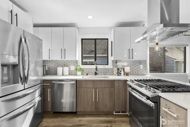 Stainless steel appliances including new Breville 3-in-1 toaster oven/air fryer stay with the home.