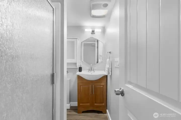 Basement bathroom complete with shower.