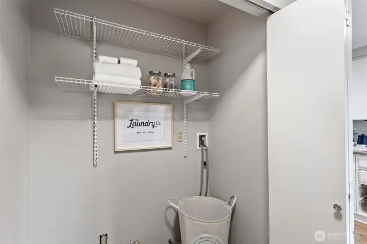 The convenient, in-unit laundry area, keeps the household chores tucked behind doors and away from main living areas. Plumbing for a gas dryer is an extra value as the gas utility is included in the HOA dues!