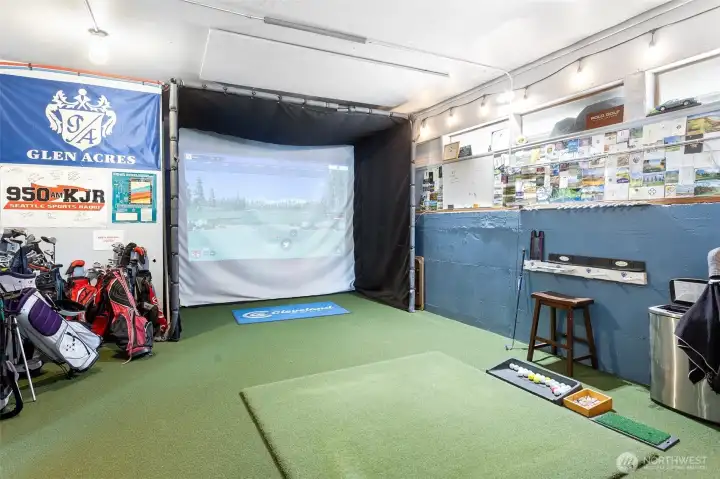 Welcome to 'The Impact Zone,' a personal year-round training facility. Featuring state-of-the-art simulated golf and precision swing training, this amenity allows playing 15 world-class virtual courses—rain or shine.