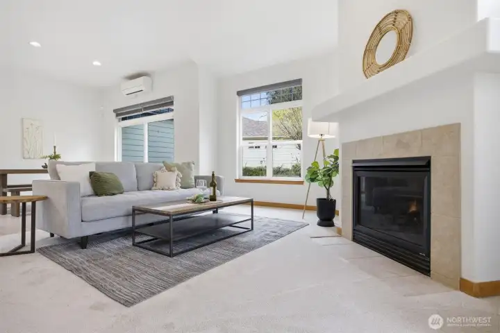 There is a lovely gas fireplace for those chilly winter evenings. The heat is radiant floor heat and there are 3 mini-splits for heating and cooling, also.