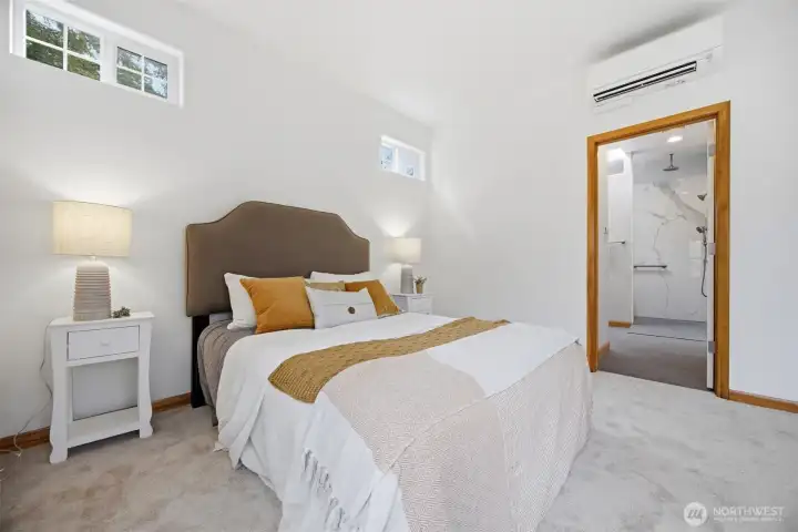 The primary suite has a new 3/4 bath with a roll-in shower.