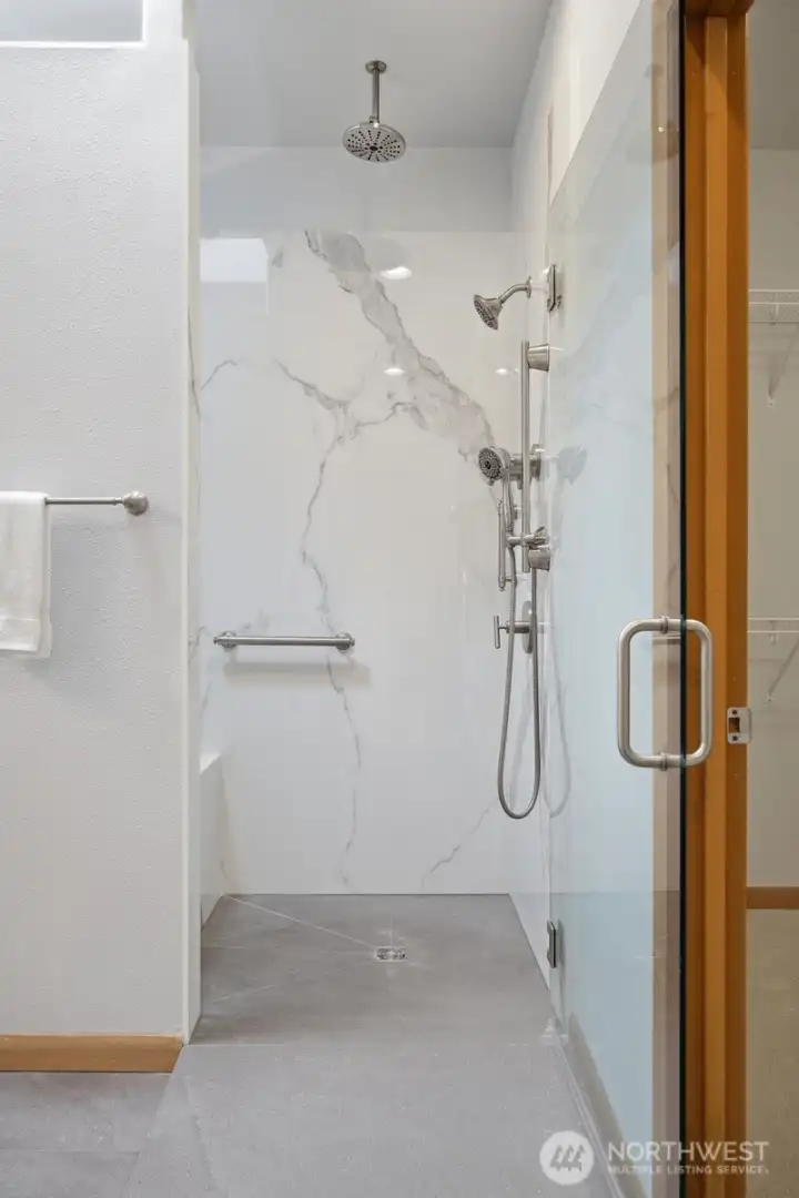 This shower can accommodate a wheelchair and is state-of-the-art.