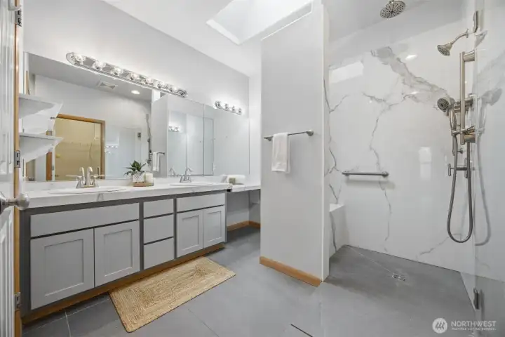 Looking at the large 2-sink vanity at the primary suite.