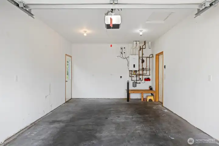 The garage has the radiant floor heating system in it with an on-demand hot water heater.