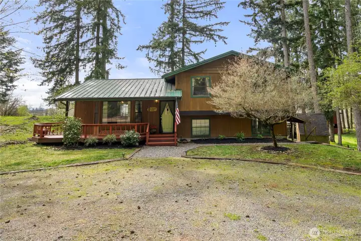 Pacific northwest feel with metal roof and wood siding.
