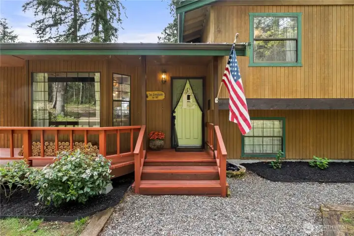 Covered front deck to enjoy your property.