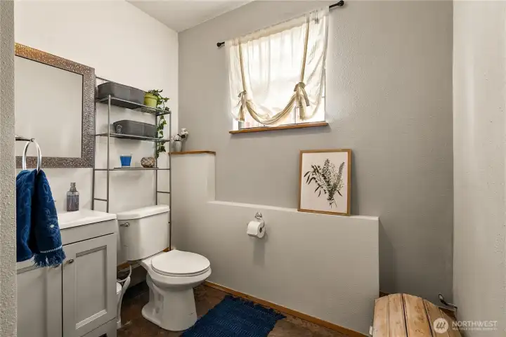 Half bathroom on lower level.