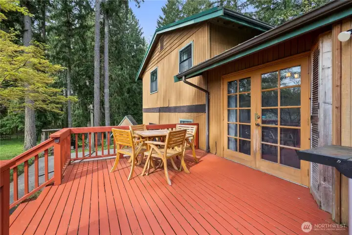 French doors lead to spacious deck.