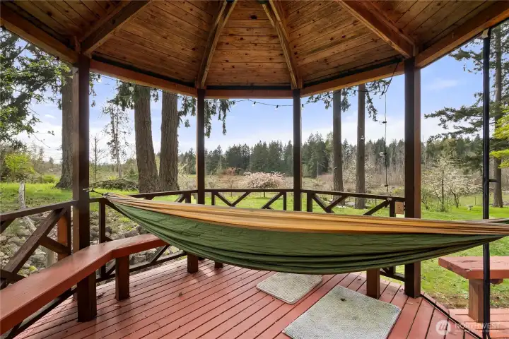 Covered gazebo to enjoy the property in the rain too!