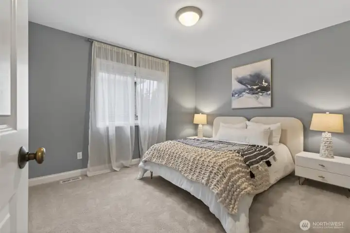 Generously sized secondary bedrooms filled with natural light.