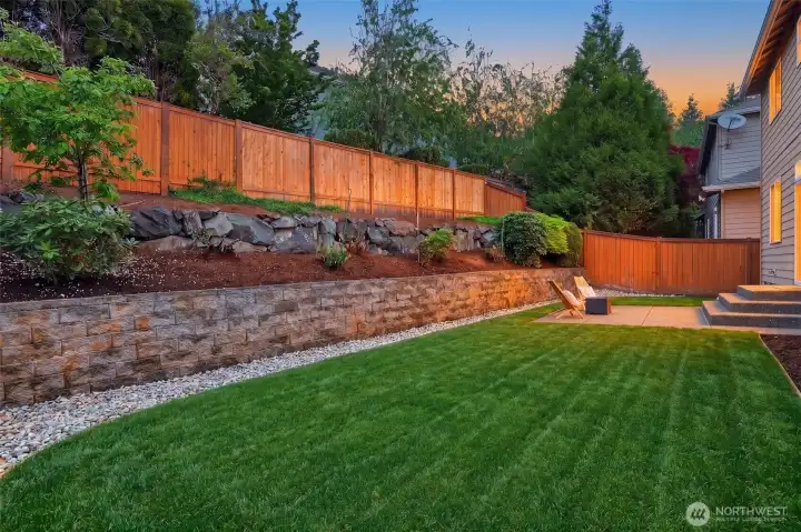 Fully fenced backyard offers privacy and peace of mind.
