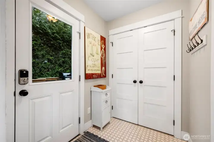 Washer/dryer, of course, behind the doors.