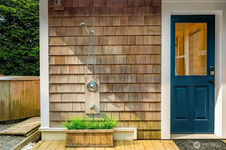 Outdoor shower to get the sand off.