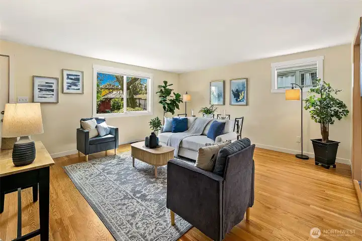 Spacious living room with hardwood floors