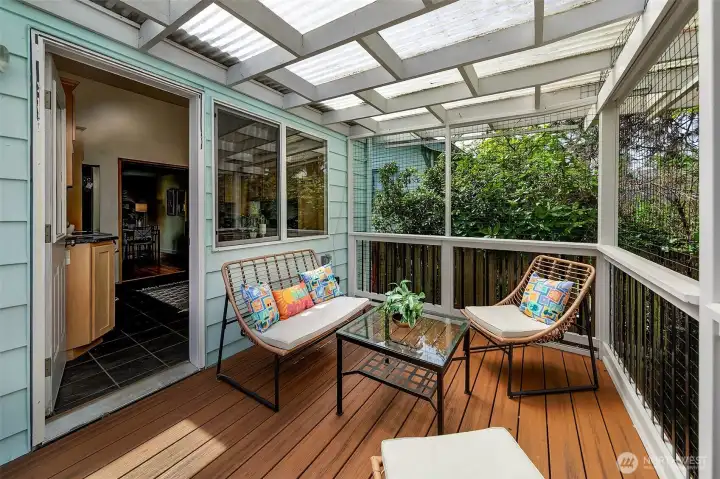 Kitchen opens to lovely covered deck!