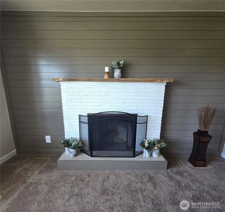Fireplace with shiplap accent wall
