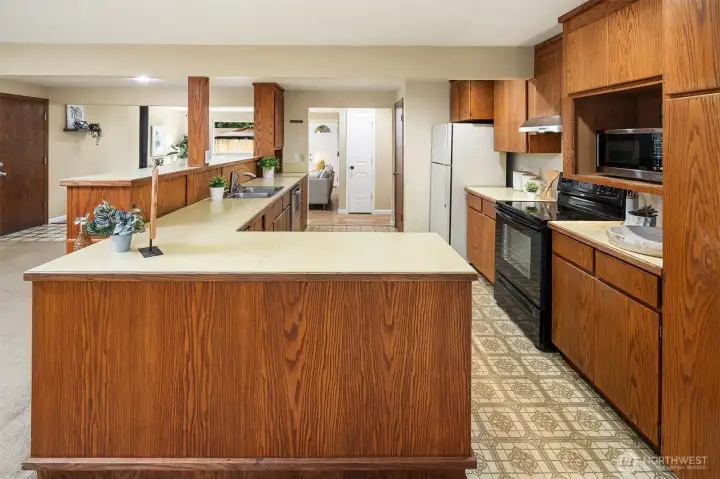 The Kitchen has incredible real wood cabinets! they don't make them like this now!