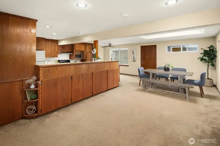 there is a huge space that would make a great second sitting area or play area between the living room and the dining area.