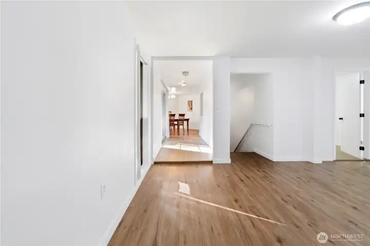 Family room on main leading to dining room