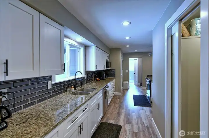 Updated kitchen with abundant cabinet space