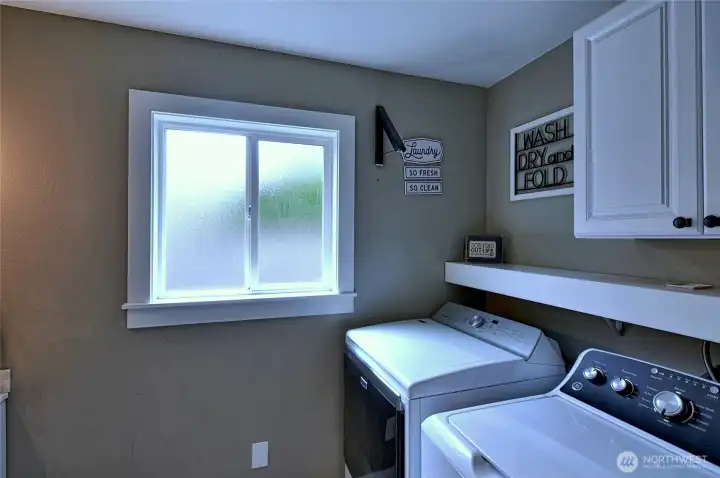 Laundry room with cabinet storage