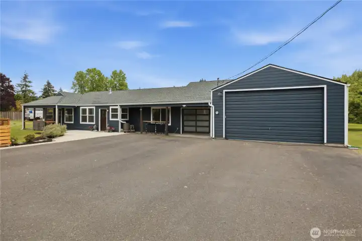 The garage should easily accomodate and RV. The smaller garage door opens into the house- great for entertaining The garage should easily accomodate and RV. The smaller garage door opens into the house- great for entertaining