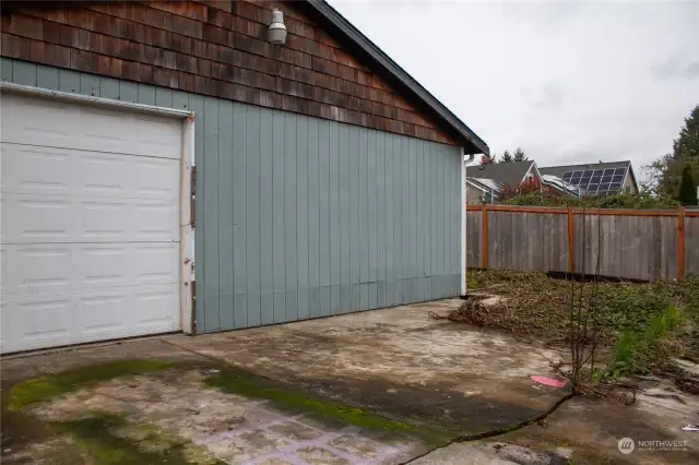 Rear of garage. Has 2nd door off the back with more parking!
