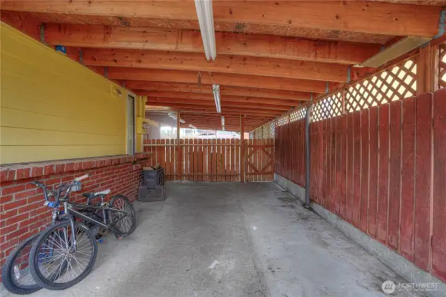 I just love the idea of outdoor living space that is sheltered from our liquid sunshine a.k.a. rain.