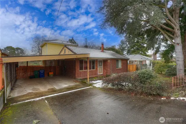 There is a large, covered carport plus tons of more off-street parking.