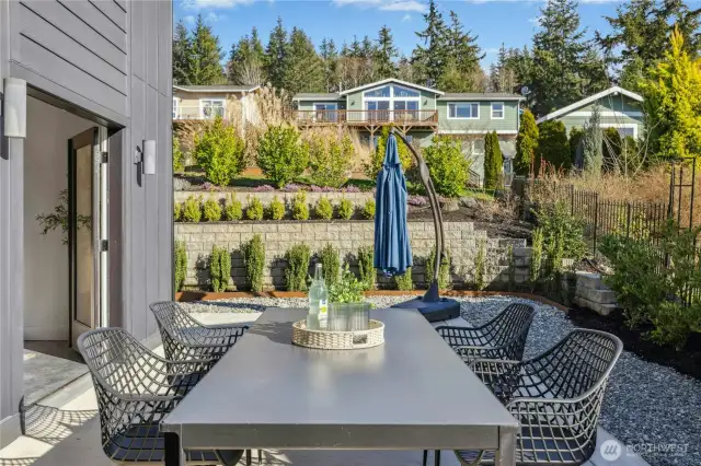 The backyard patio. There is extensive cement work and custom landscaping thought this property.