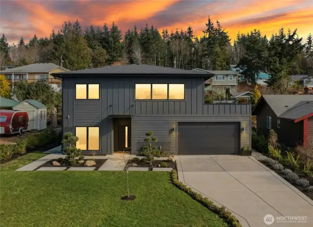 Custom built in 2023, this modern 3-bedroom view home with a roof-deck is a rare find in the Driftwood Key Neighborhood.