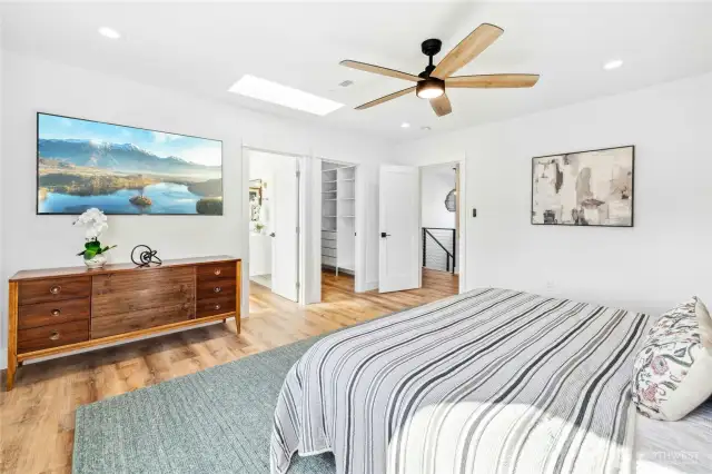 Another look at the primary bedroom suite.