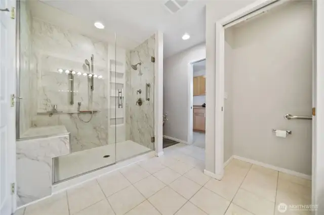 Updated walk-in shower in primary bathroom