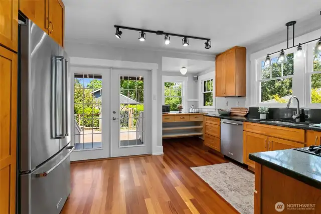 Light & Bright Kitchen with French Doors leading to the patio