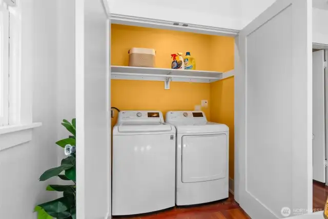 an auto lit laundry area is one of the many features this home offers