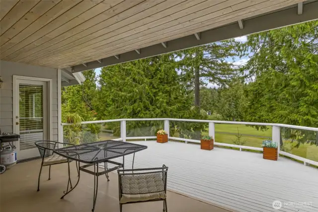 Deck is partly covered and sheltered from weather - and partly "showered" with sunshine!