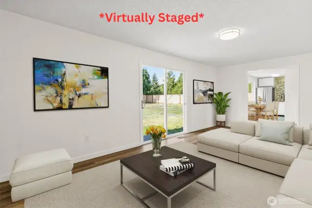 Family room silder opens to massive backyard