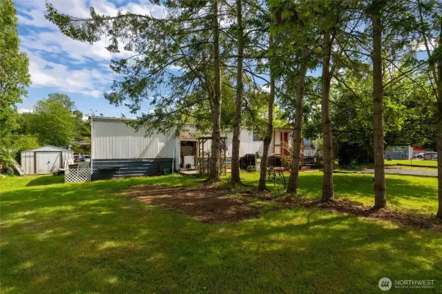 Oversized Lot with Lush Greenery- Enjoy over 1/3 of an acre of flat, usable land in the heart of Birch Bay. Shaded by mature trees and full of potential, this large lot is perfect for summer gatherings, future expansion, or simply enjoying the peaceful beach-town vibe.