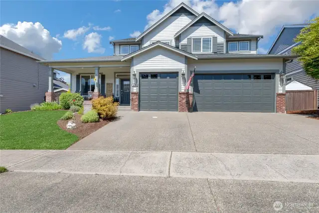Three car garage with extra room for storage inside