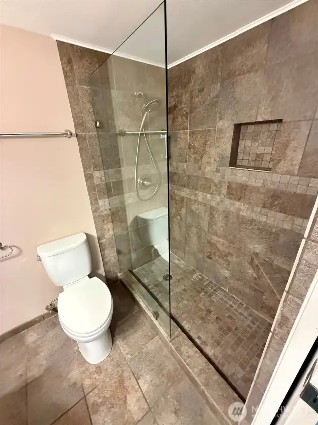 Primary fully tiled shower