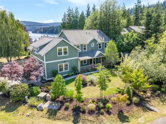 Front Aerial view of home with Lake Whatcom in background.