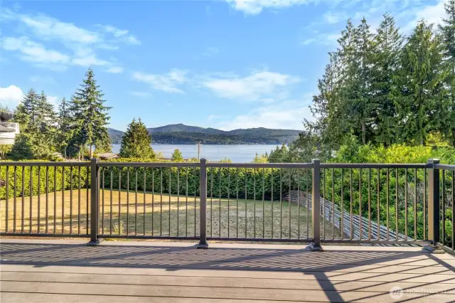 New trex balcony off of owner's suite with incredible lake view.