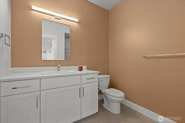 Main floor bathroom also features walk in shower.