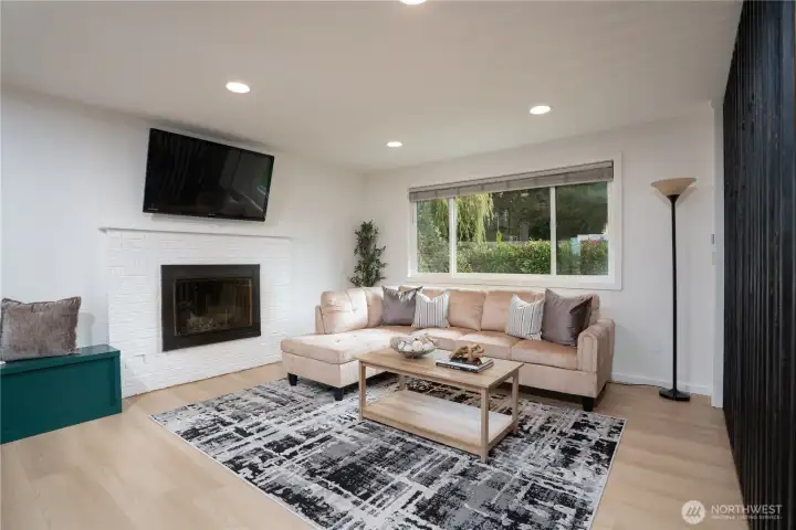Open, spacious living room perfect for relaxing and entertaining guests.