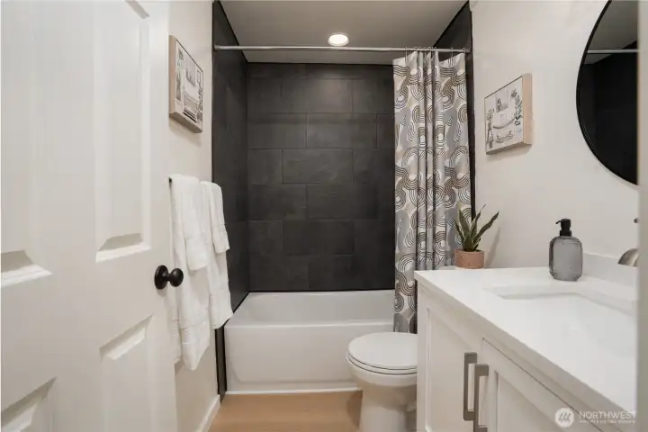 Bathroom 2 Contemporary bathroom featuring elegant fixtures, modern tiles, and a clean look.