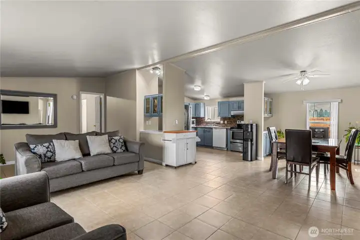 The entryway leads to the living room, dining room, and kitchen!
