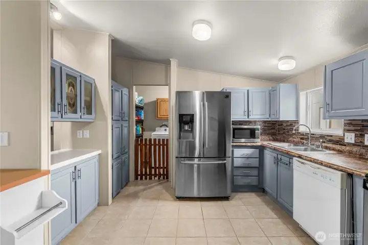 Kitchen with laundry room in the back!